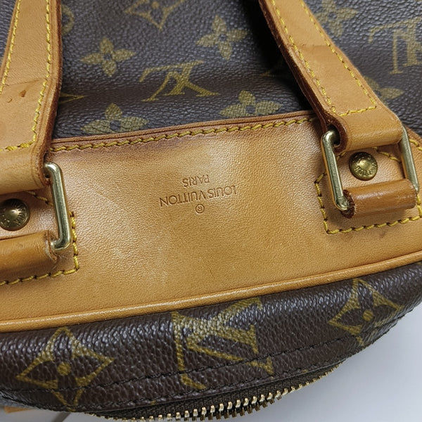 EXCURSION Monogram Coated Canvas Brown
