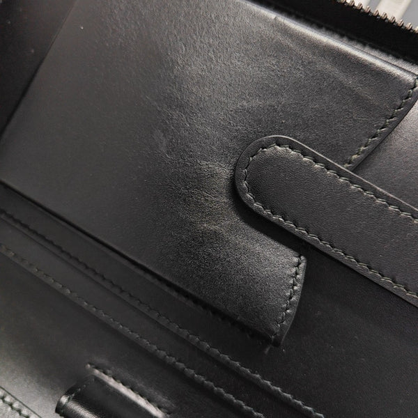 Monogram Coated Canvas Clutch Black