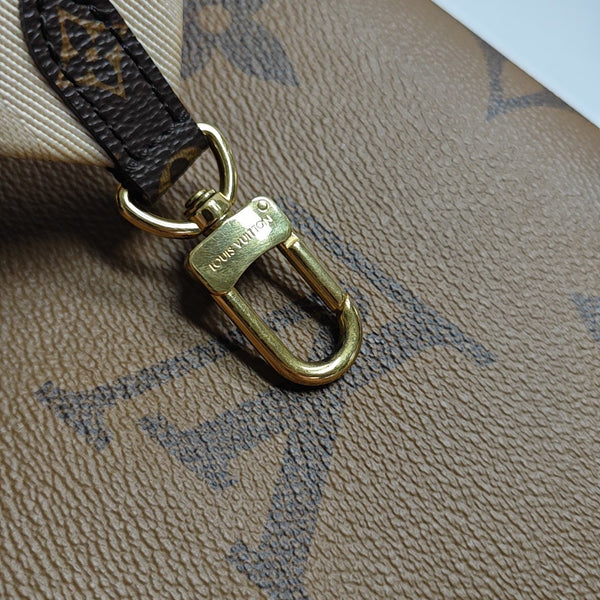 ONTHEGO PM Monogram Coated Canvas Brown
