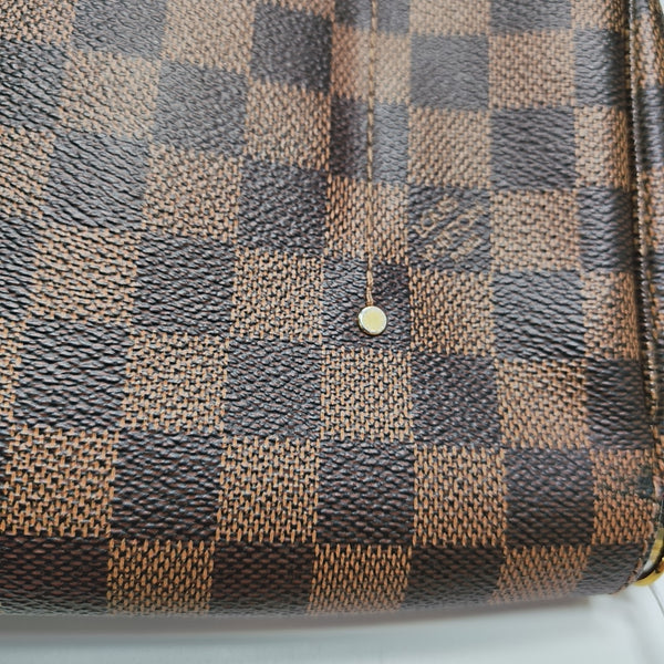 FAVORITE MM Damier Ebene Coated Canvas Brown