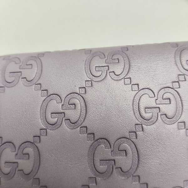 Monogram Calfskin Key Pouch Purple