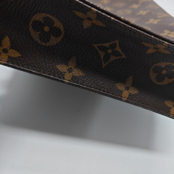 TOILET POCKET 26 Monogram Coated Canvas Brown
