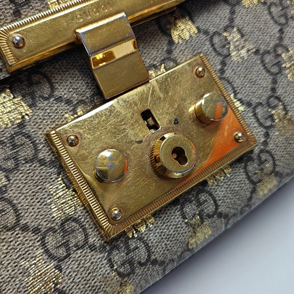 Authenticated pre-owned Padlock Small Monogram Coated Canvas Beige - Shoulder Bag at Looply
