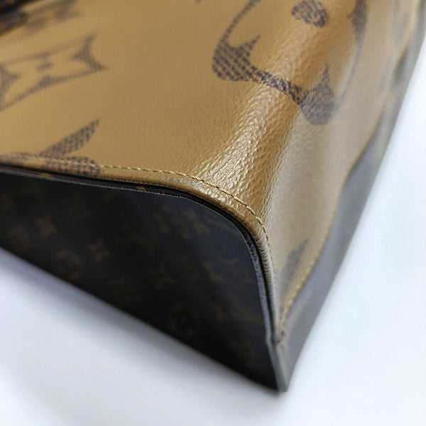 ONTHEGO GM Monogram Coated Canvas Brown