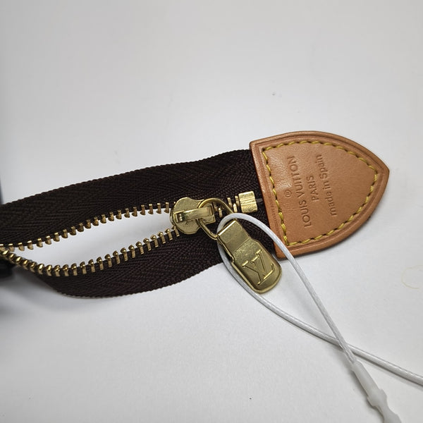 TOILET POCKET Monogram Coated Canvas Brown