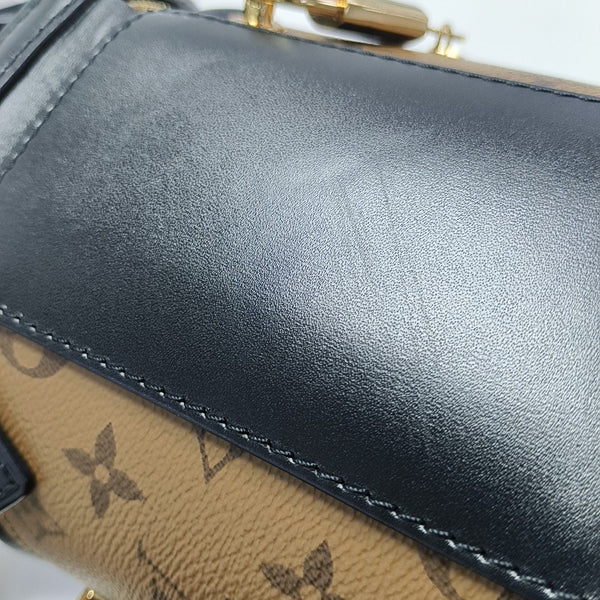 CANNES PM Monogram Coated Canvas Brown