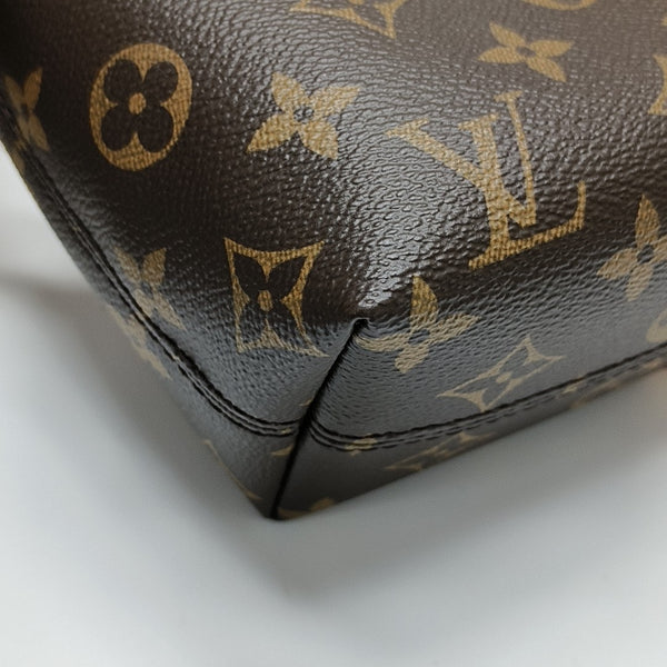 Pochette Mia Monogram Coated Canvas Brown