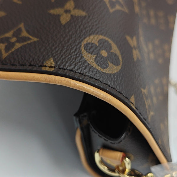 Pochette Camille Monogram Coated Canvas Brown