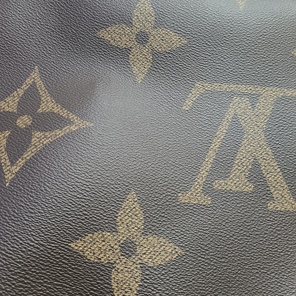 ONTHEGO GM Monogram Coated Canvas Brown