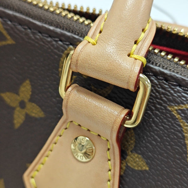 SPEEDY 20 Monogram Coated Canvas Brown