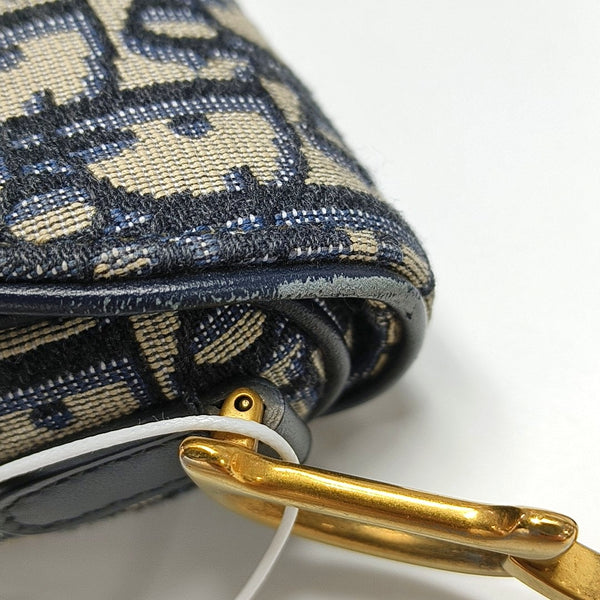 Authenticated pre-owned Saddle Mini Monogram Canvas Blue - Top Handle Bag at Looply