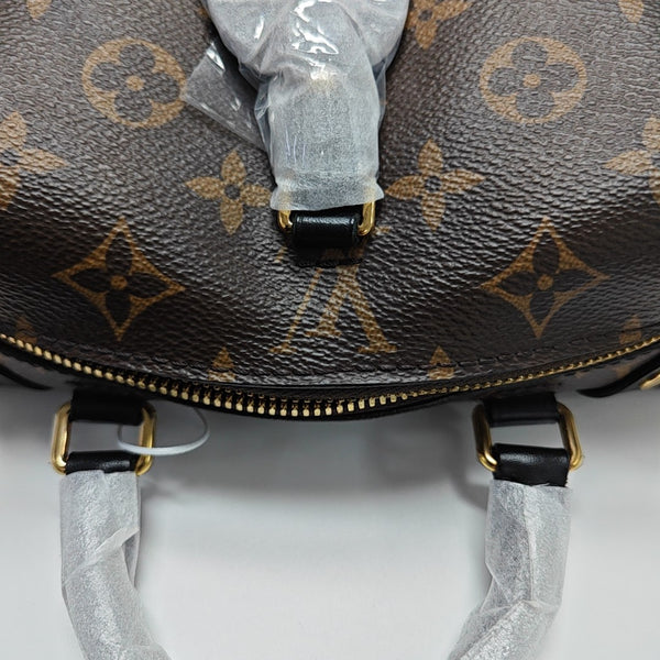 PETITE MALLE Monogram Coated Canvas Brown