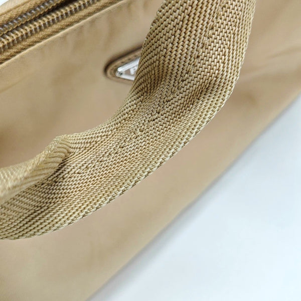 Authenticated pre-owned Re-Edition2000 Mini Nylon Beige - Top Handle Bag at Looply