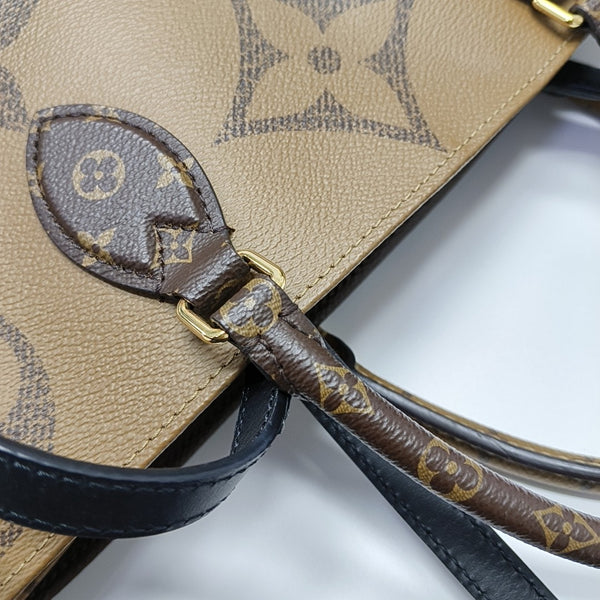 ONTHEGO GM Monogram Coated Canvas Brown