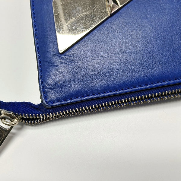 Authenticated pre-owned Monster Calfskin Blue - Clutch at Looply