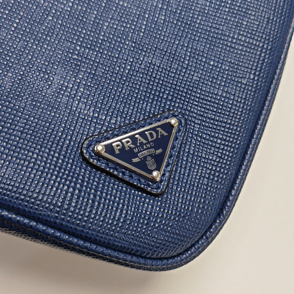 Authenticated pre-owned Triangle Small Leather Blue - Clutch at Looply
