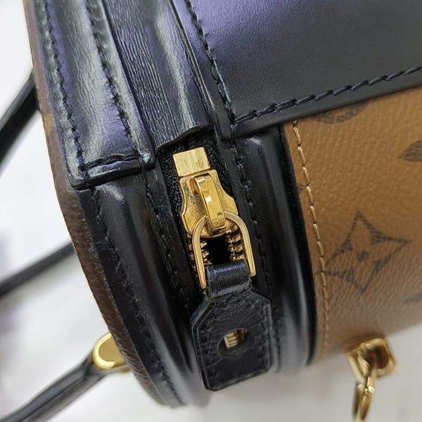 CANNES PM Monogram Coated Canvas Brown
