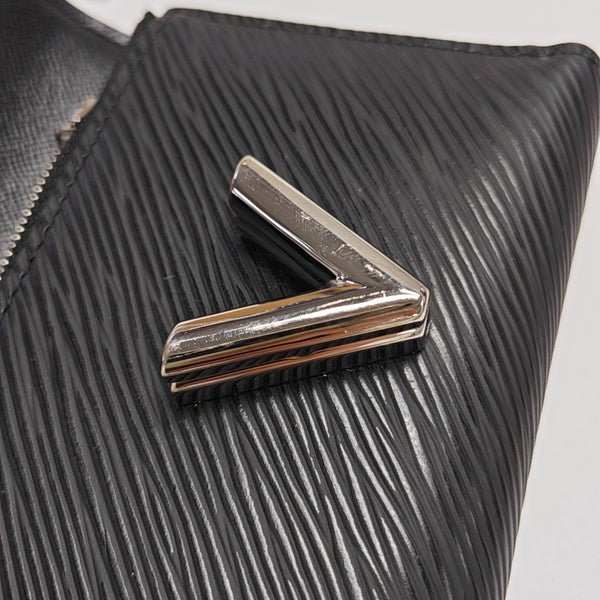 Authenticated pre-owned TWIST Epi Black Wallet - Wallet at Looply