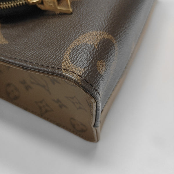ONTHEGO PM Monogram Coated Canvas Brown