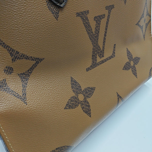 ONTHEGO MM Monogram Coated Canvas Brown