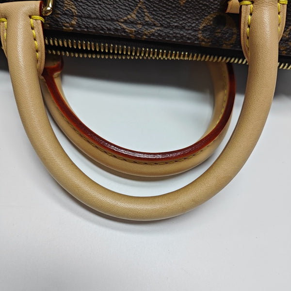 SPEEDY 25 Monogram Coated Canvas Brown