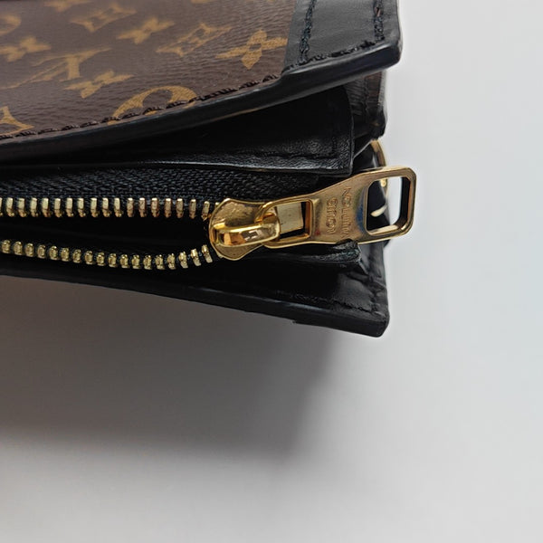 TRUNK Monogram Coated Canvas Brown