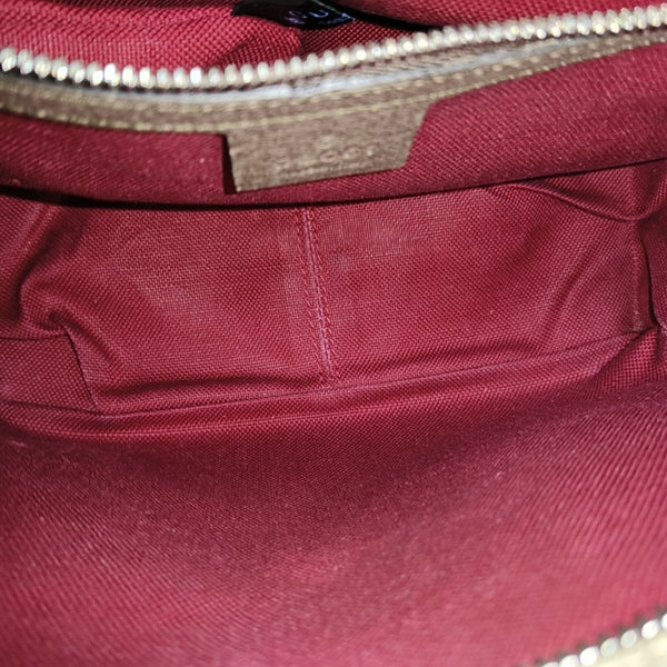 Trunk Monogram Coated Canvas Brown