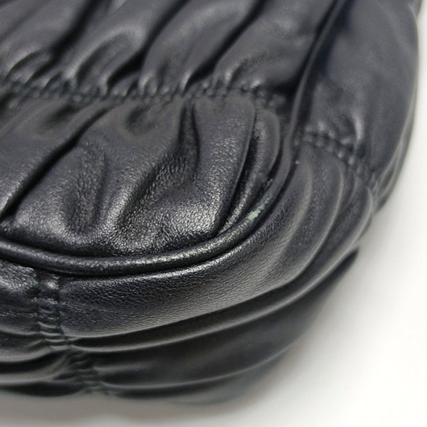 Authenticated pre-owned Re-Edition2005 Quilted Lambskin Black - Top Handle Bag at Looply