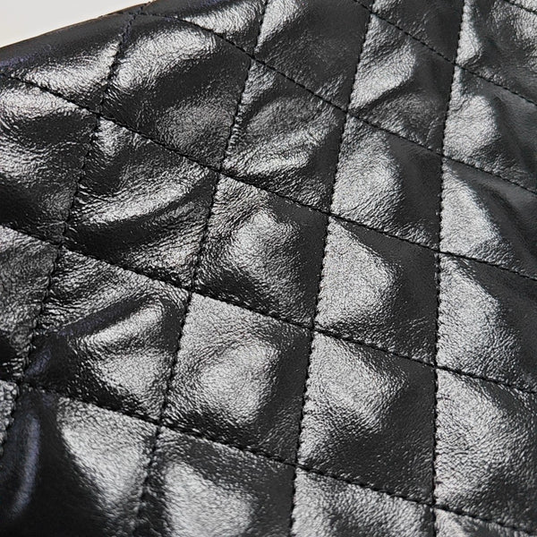 CHANEL 25 Small Quilted Waxed Cafskin Black