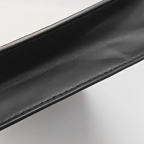 Pochette Voyag MM Monogram Coated Canvas Black
