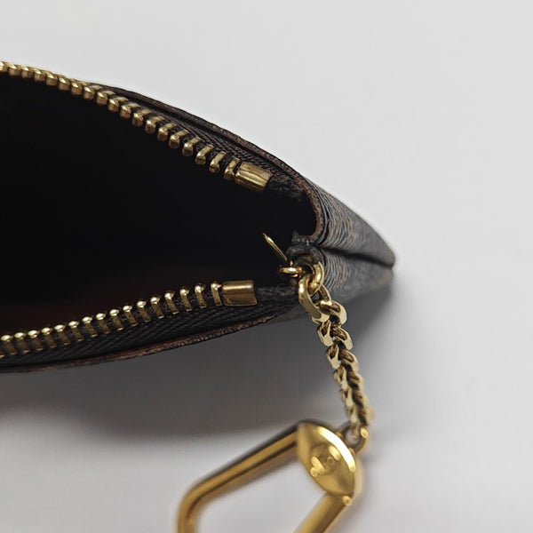 Monogram Coated Canvas Clutch Brown