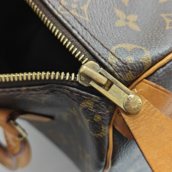 SPEEDY 25 Monogram Coated Canvas Brown