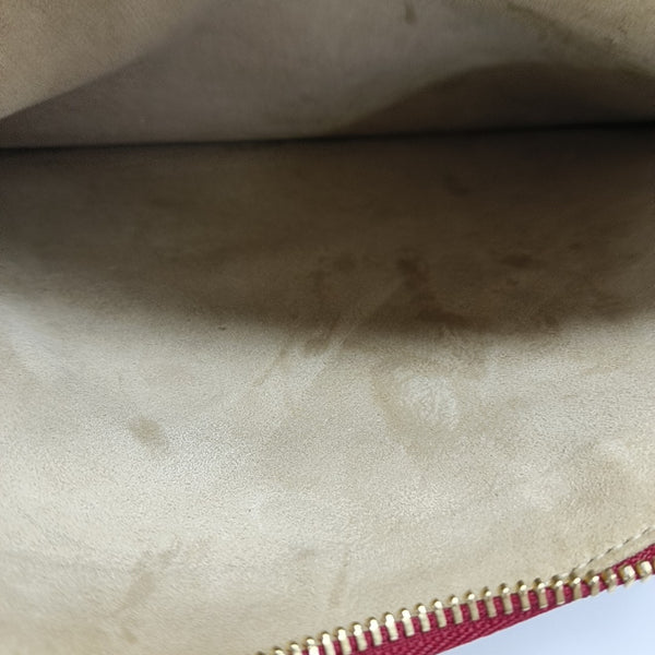 Monogram Coated Canvas Clutch Blue