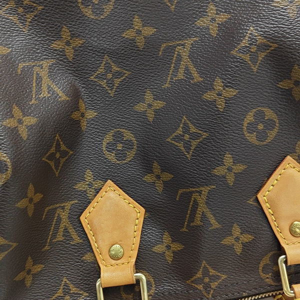 SPEEDY 25 Monogram Coated Canvas Brown