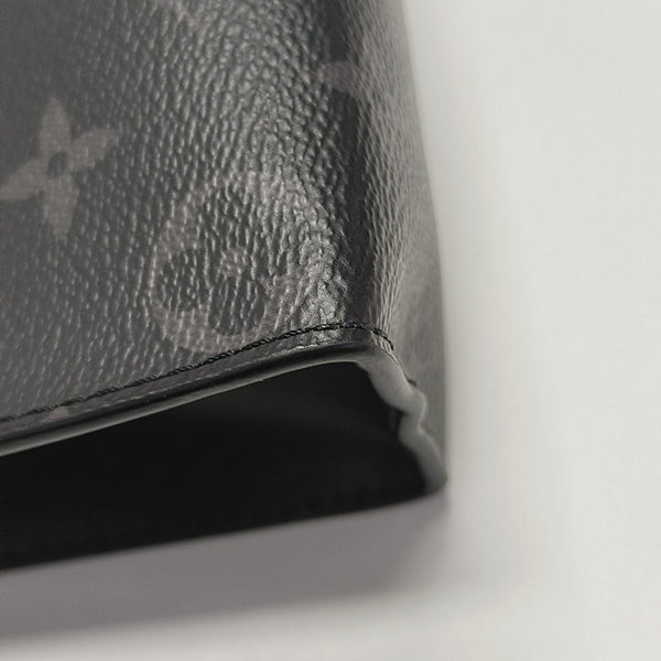 Pochette Voyag MM Monogram Coated Canvas Black
