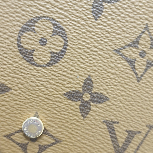 CANNES PM Monogram Coated Canvas Brown