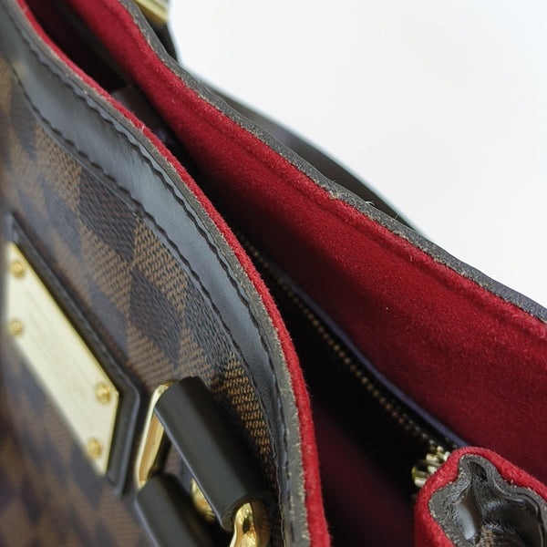 HAMPSTEAD PM Damier Ebene Coated Canvas Brown