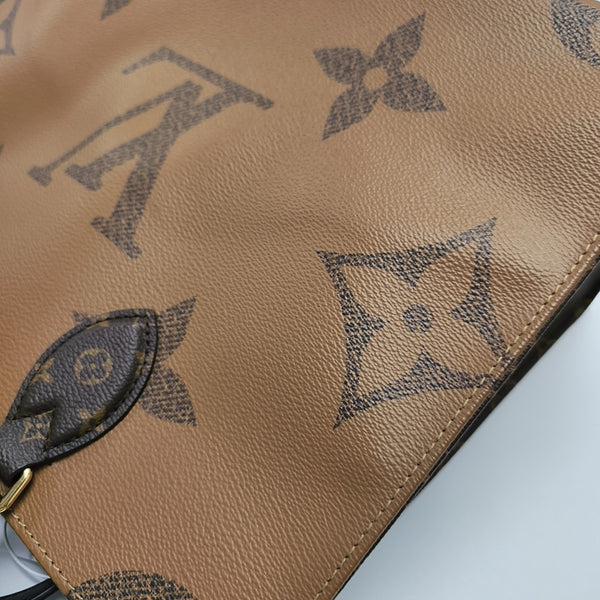 ONTHEGO MM Monogram Coated Canvas Brown