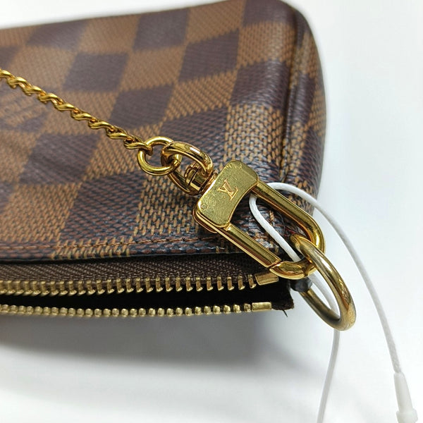 Authenticated pre-owned ACCESSOIRES Mini Damier Ebene Coated Canvas Brown - Top Handle Bag at Looply