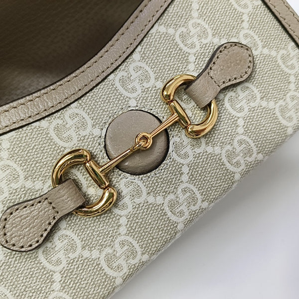 Authenticated pre-owned Horsebit 1955 Mini Monogram Coated Canvas White - Shoulder Bag at Looply