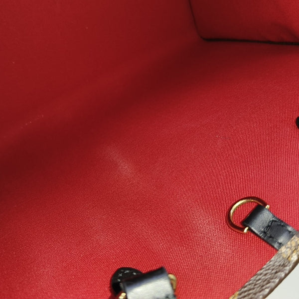 ONTHEGO MM Monogram Coated Canvas Brown