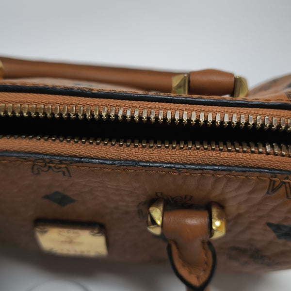 ESSENTIAL Monogram Coated Canvas Brown