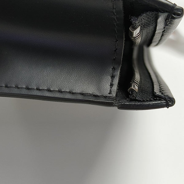 Pochette Voyag MM Monogram Coated Canvas Black