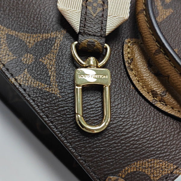 ONTHEGO PM Monogram Coated Canvas Brown