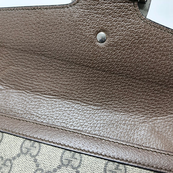 Authenticated pre-owned Dionysus Monogram Coated Canvas Beige - Clutch at Looply