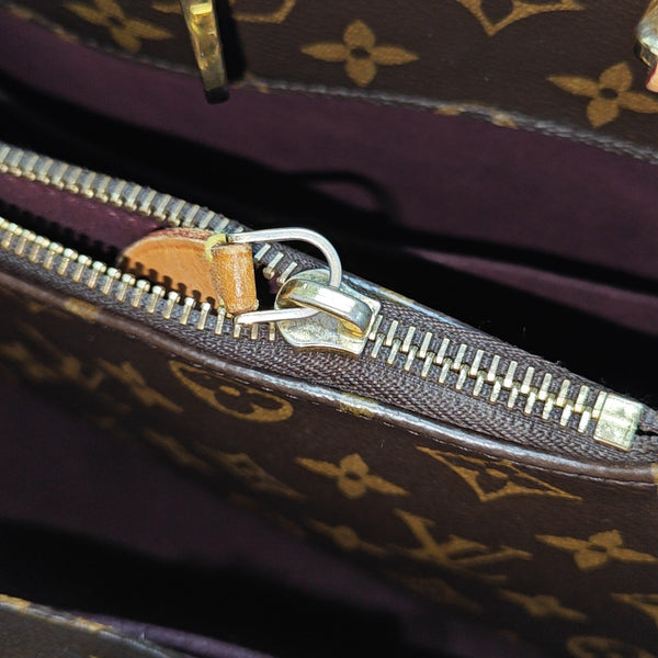 MONTAIGNE GM Monogram Coated Canvas Brown