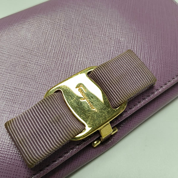 Authenticated pre-owned Vara Calfskin Purple Wallet - Wallet at Looply