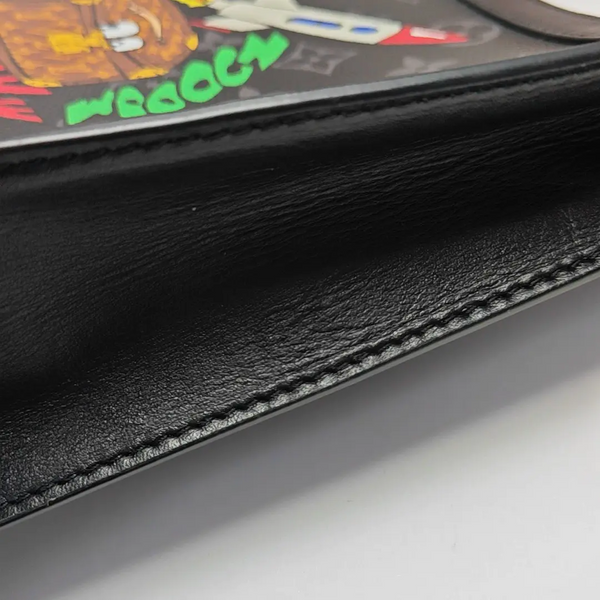 Pochette Voyag MM Monogram Coated Canvas Black