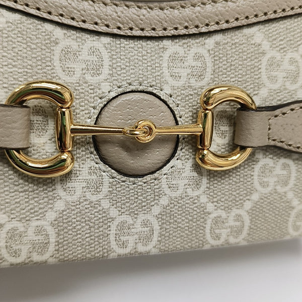 Authenticated pre-owned Horsebit 1955 Mini Monogram Coated Canvas White - Shoulder Bag at Looply