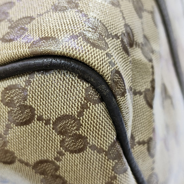 Joy Medium Monogram Coated Canvas Brown